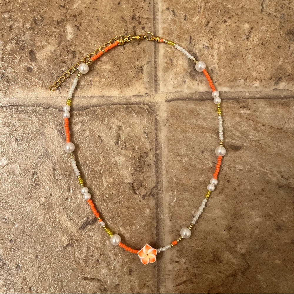 Orange and yellow plumeria flower necklace